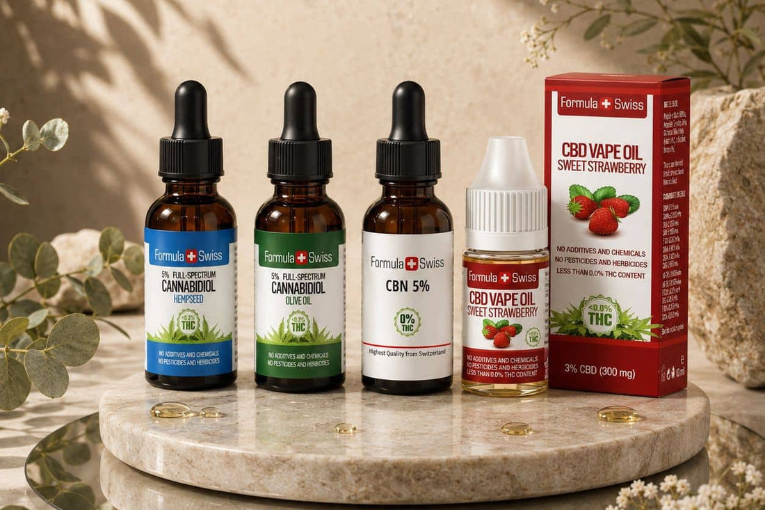 Formula Swiss 5 % CBD olier i hampefrøolie og olivenolie, CBN olie 5 % og en CBD vape olie med jordbær på et marmorpodie